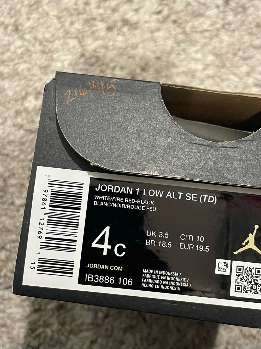 Jordan Black and White Toddler Sneakers with Red Accent